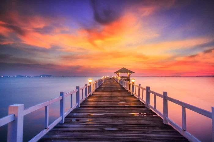 Fiery sunset across the pier