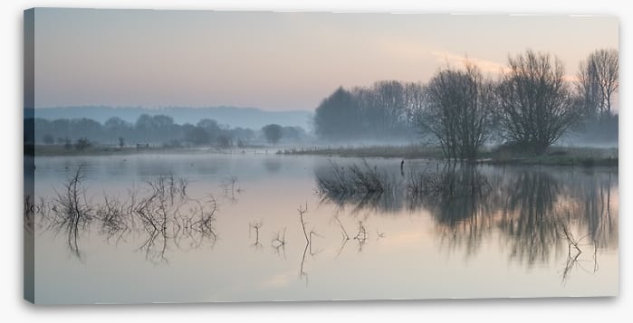 Sunrise glow over misty lake - Image 2